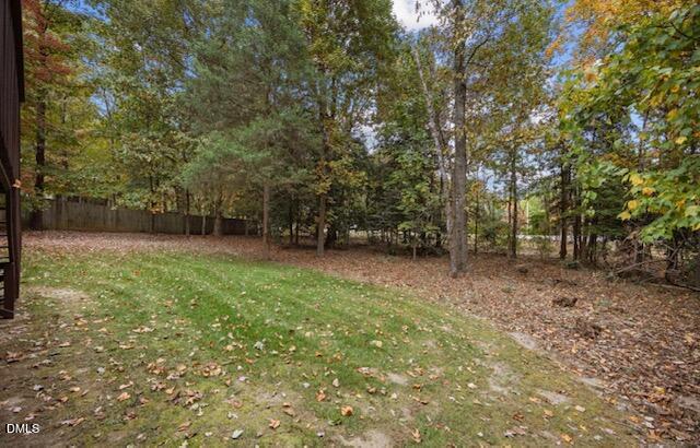 3616 Dewing Drive Raleigh, NC 27616 - Photo 22 of 25 a view of a yard with a tree