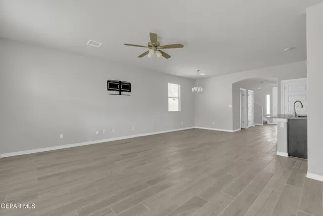 an aerial view of a city with streets and houses