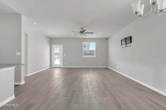 a bathroom with a bathtub and mirror