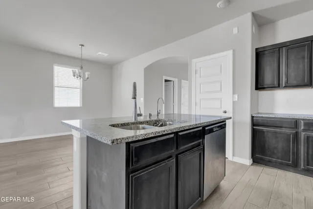 a bathroom with a sink toilet and a mirror