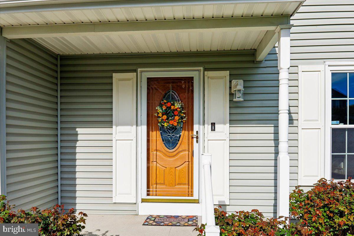5614 Cliff Side Court Baltimore, MD 21225 - Photo 2 of 28 a front view of a house with a shower
