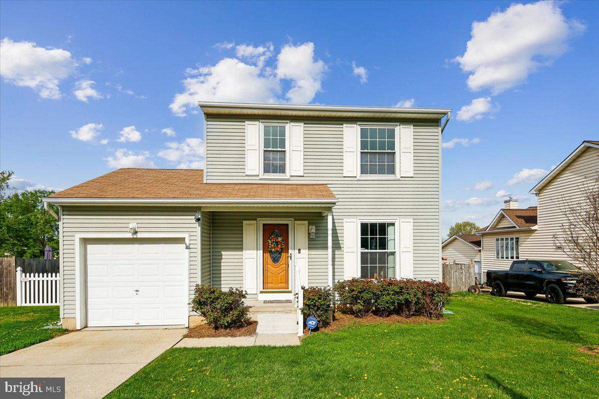 5614 Cliff Side Court Baltimore, MD 21225 - Photo 21 of 28 a view of a house with a yard