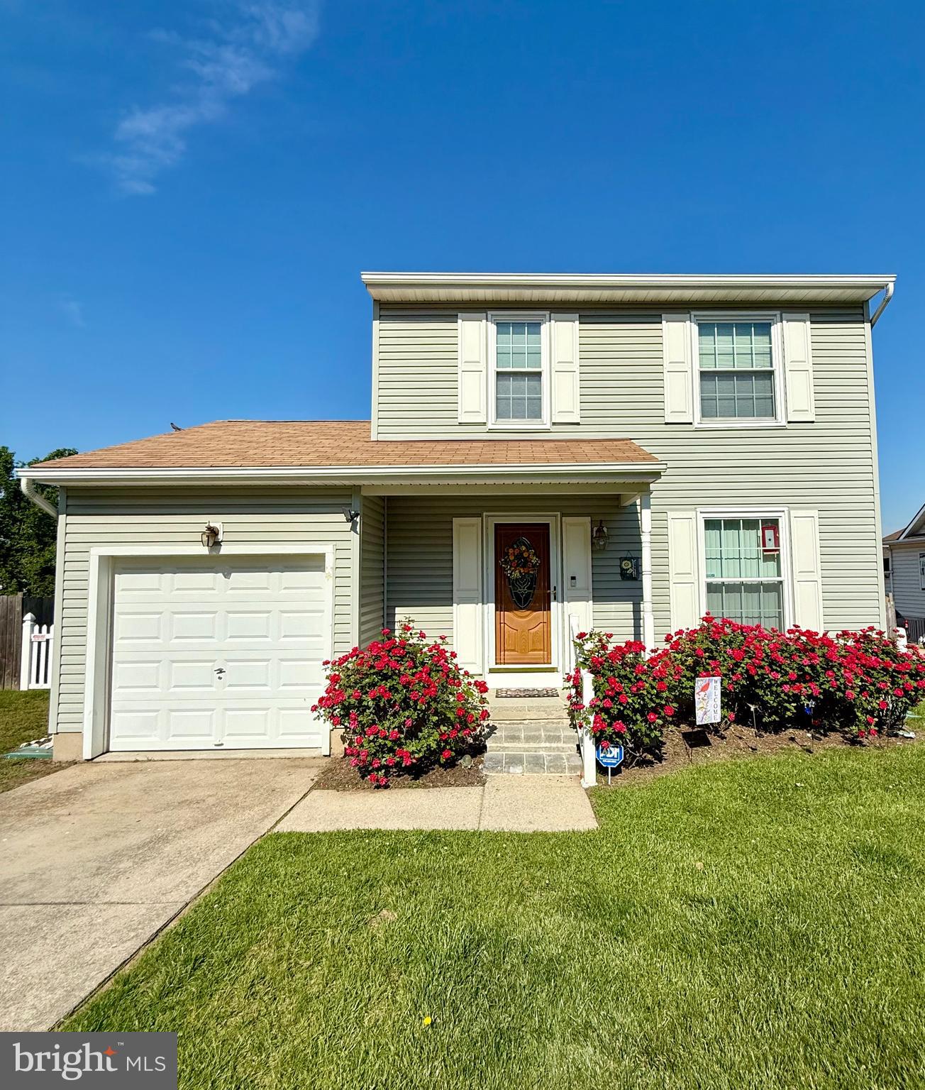 5614 Cliff Side Court Baltimore, MD 21225 - Photo 23 of 28 front view of a house with a yard