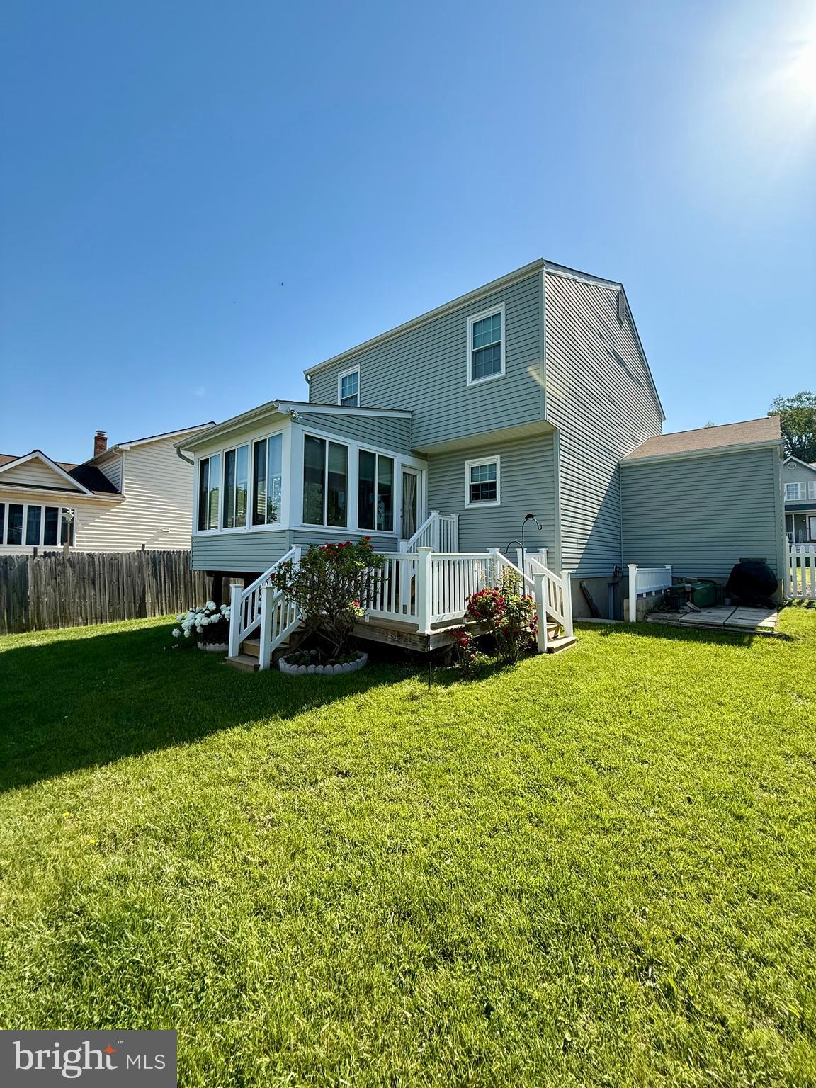 5614 Cliff Side Court Baltimore, MD 21225 - Photo 24 of 28 a front view of house with yard and outdoor seating