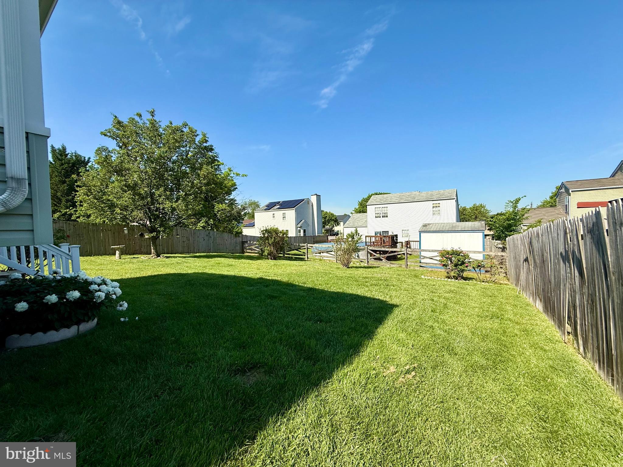 5614 Cliff Side Court Baltimore, MD 21225 - Photo 25 of 28 a view of a house with backyard and sitting area