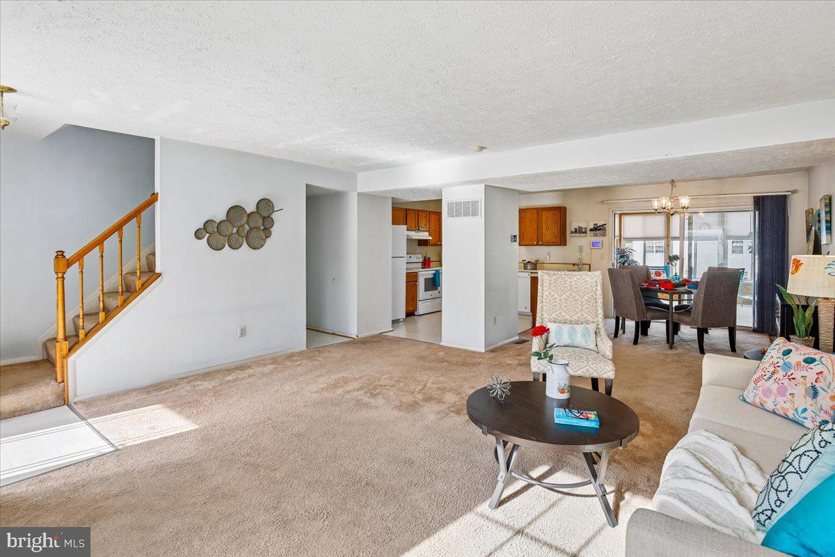 5614 Cliff Side Court Baltimore, MD 21225 - Photo 10 of 28 a living room with furniture and wooden floor