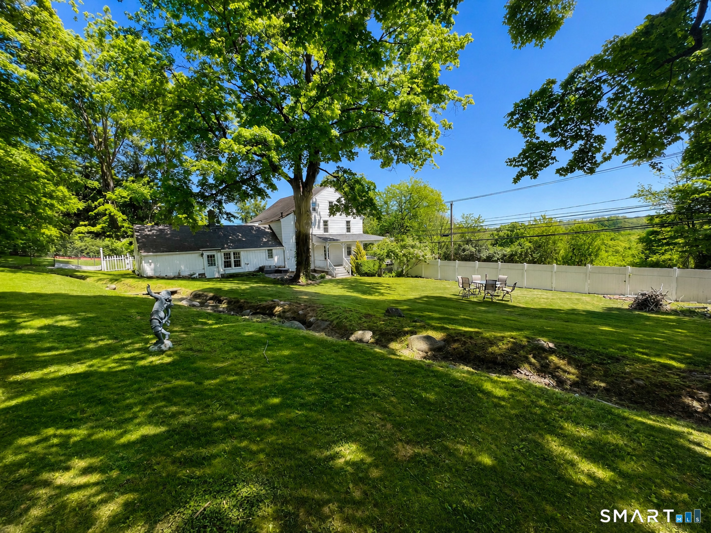 443 Amity Road Bethany, CT 06524 - Photo 8 of 30 a view of a golf course with a tree