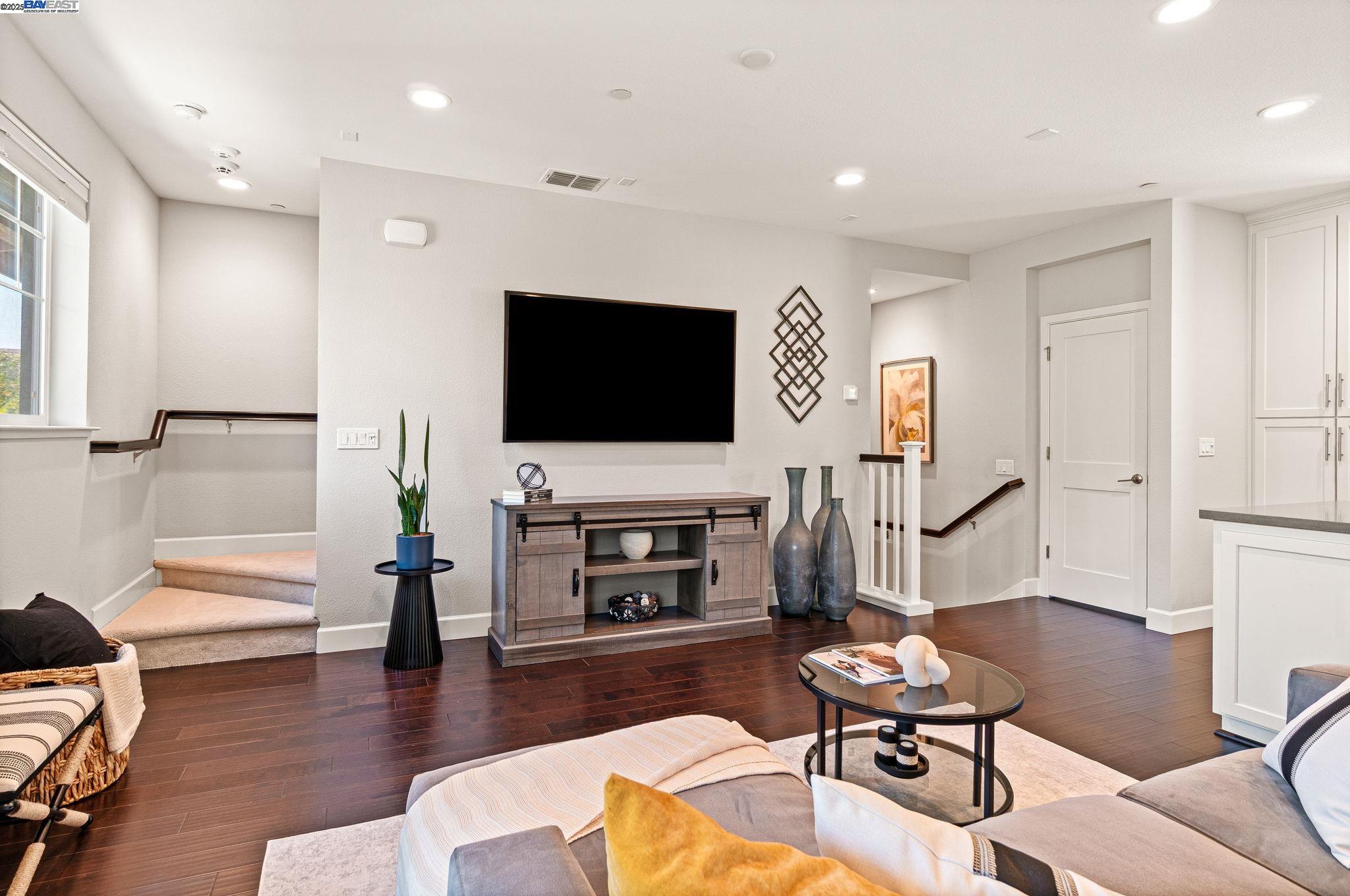 849 Tranquility Circle, Unit 3 Livermore, CA 94551 - Photo 12 of 60 a living room with furniture and a flat screen tv