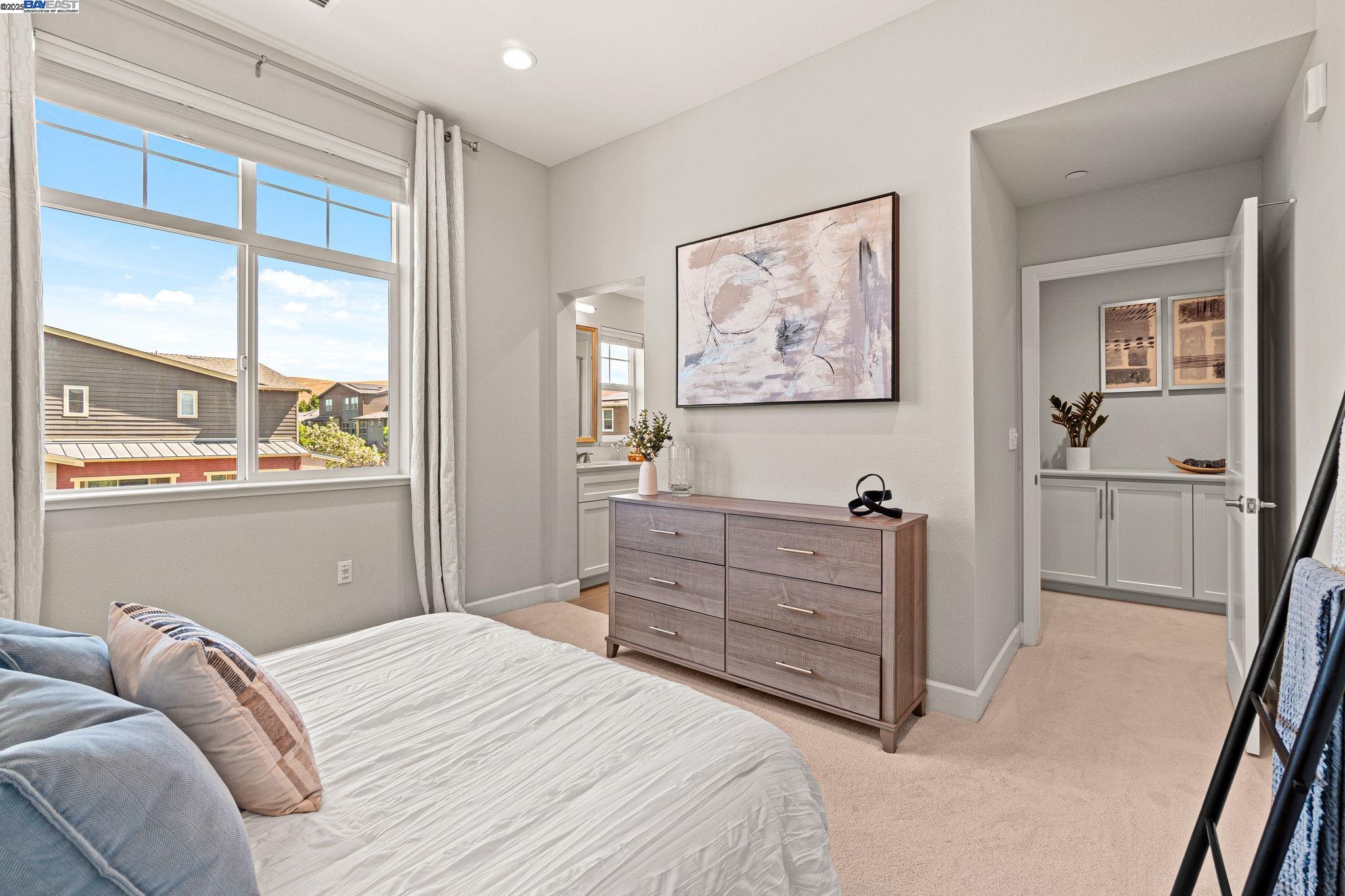 849 Tranquility Circle, Unit 3 Livermore, CA 94551 - Photo 17 of 60 a bedroom with a bed and a window