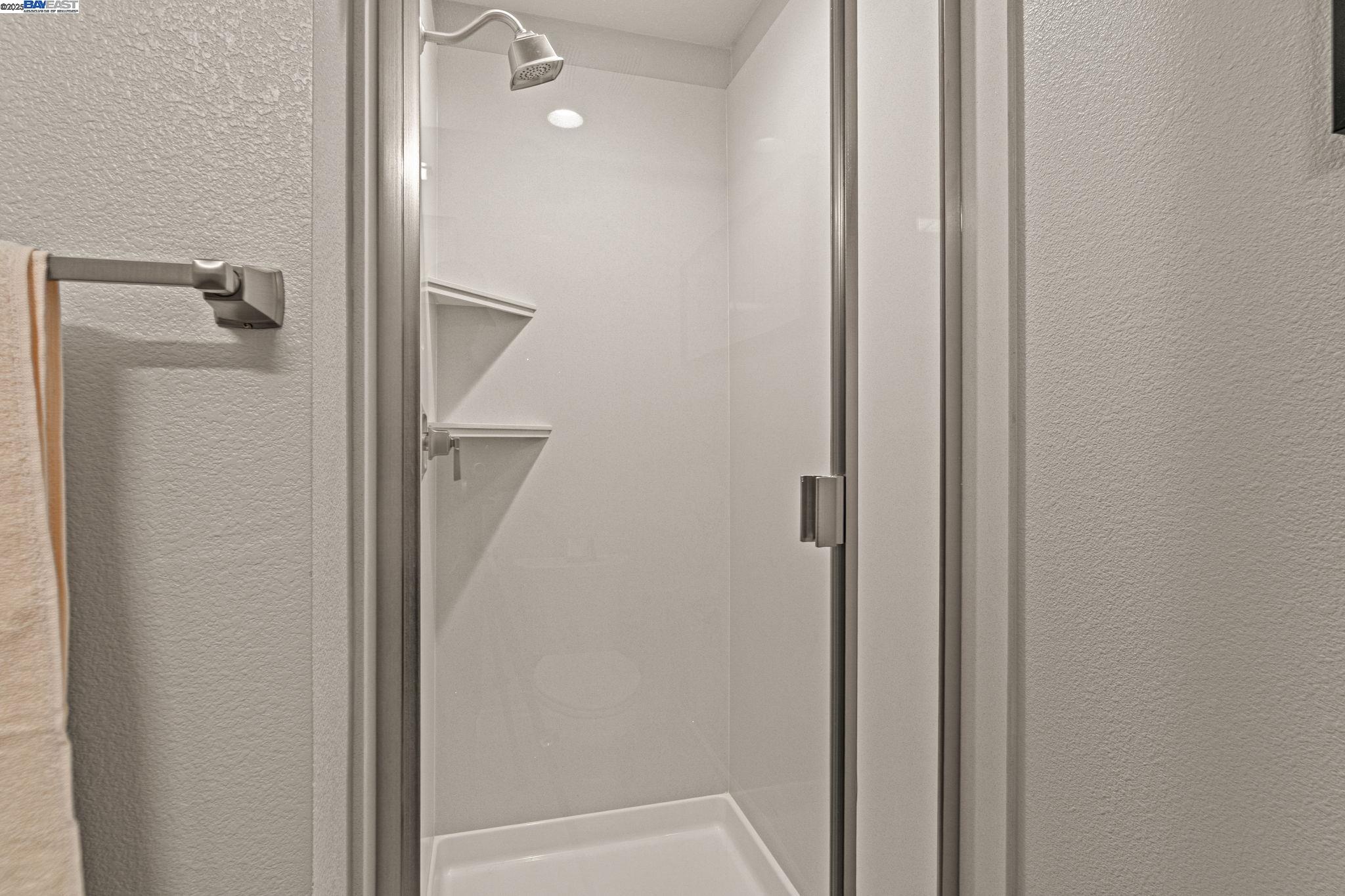 849 Tranquility Circle, Unit 3 Livermore, CA 94551 - Photo 24 of 60 a bathroom with a shower