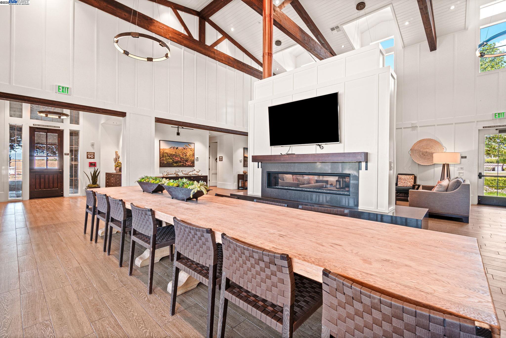 849 Tranquility Circle, Unit 3 Livermore, CA 94551 - Photo 33 of 60 a living room with furniture a flat screen tv and a fireplace