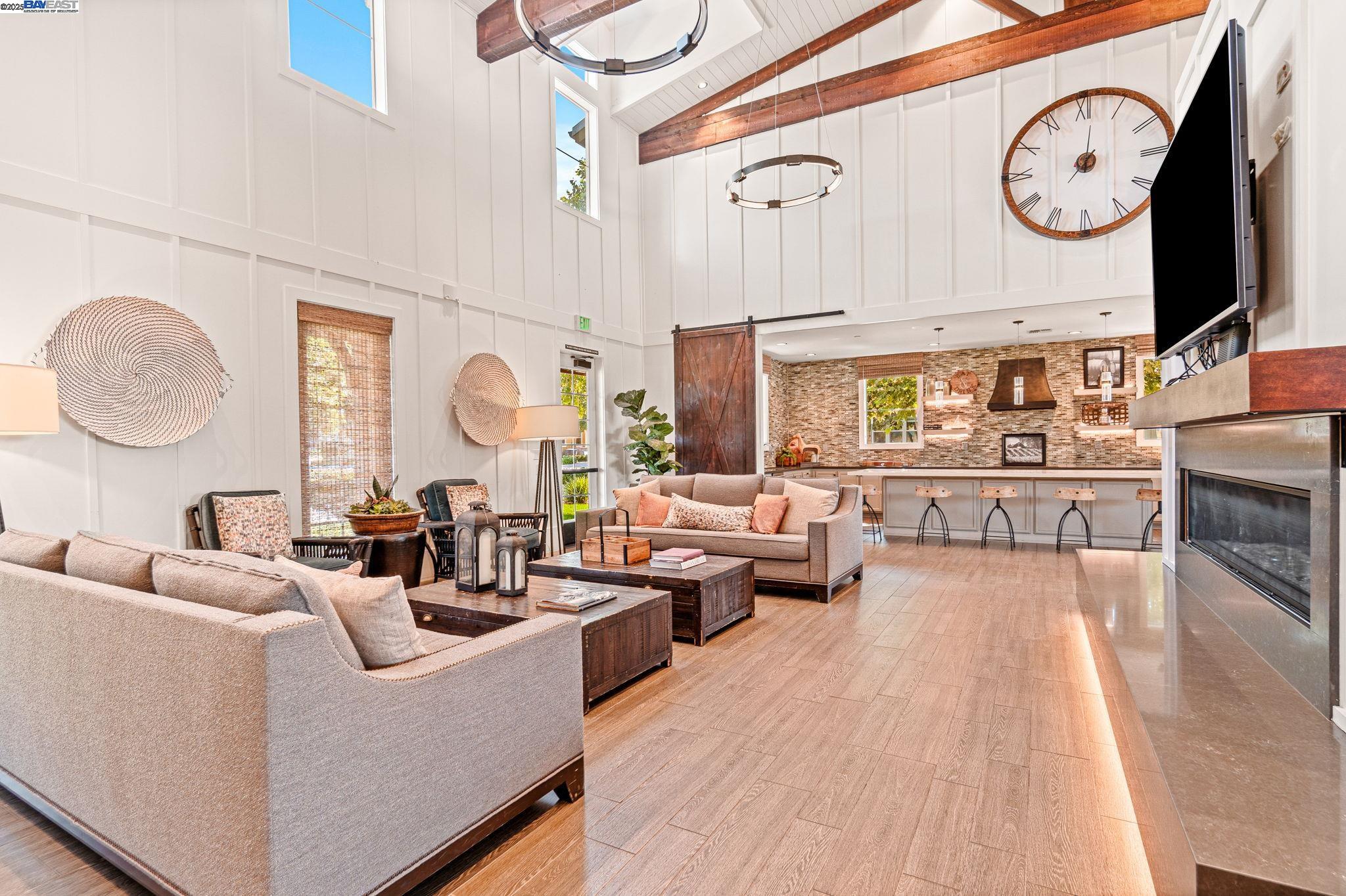 849 Tranquility Circle, Unit 3 Livermore, CA 94551 - Photo 34 of 60 a living room with fireplace furniture and a mirror