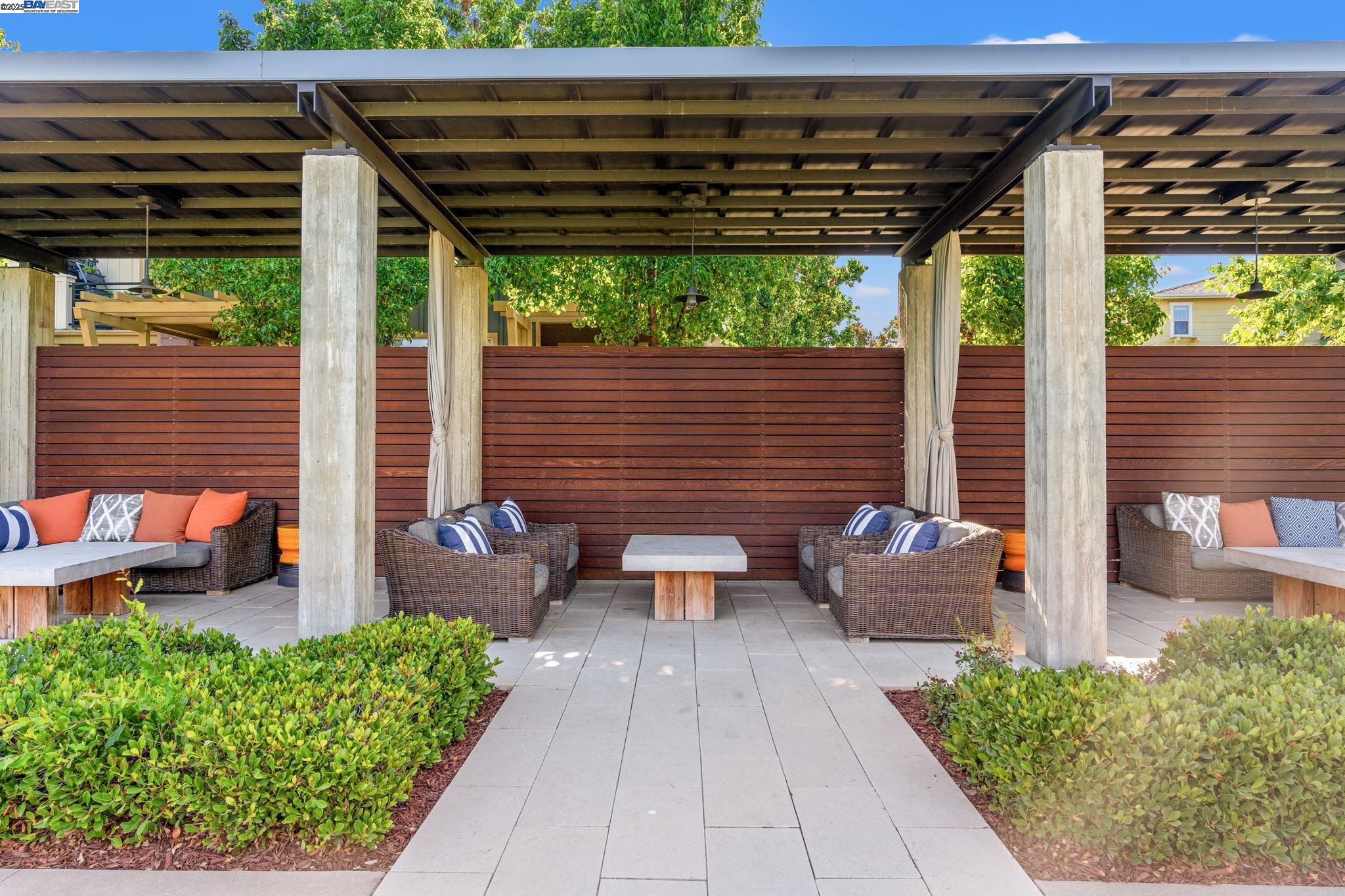 849 Tranquility Circle, Unit 3 Livermore, CA 94551 - Photo 40 of 60 a view of a patio with couches chairs and potted plants