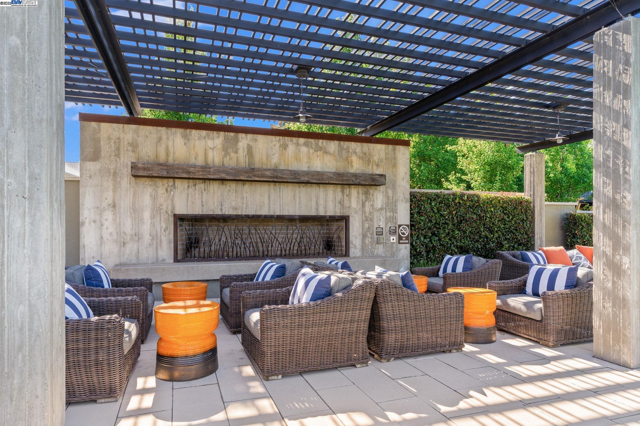 849 Tranquility Circle, Unit 3 Livermore, CA 94551 - Photo 41 of 60 a view of a patio with a table and chairs with wooden floor and fence