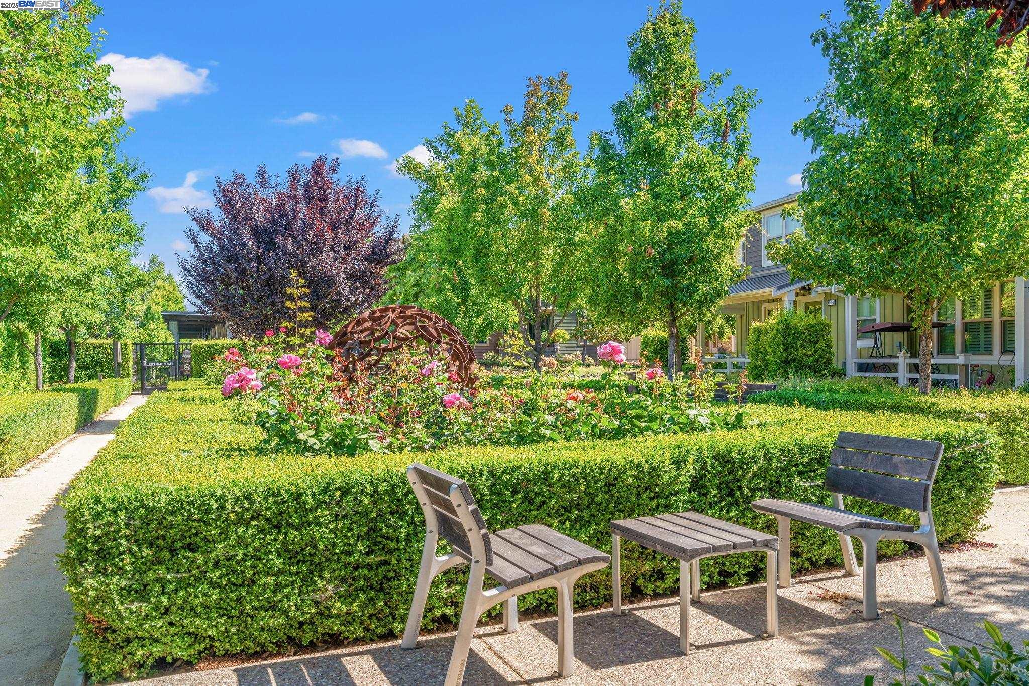 849 Tranquility Circle, Unit 3 Livermore, CA 94551 - Photo 57 of 60 a view of a chairs and table in the garden
