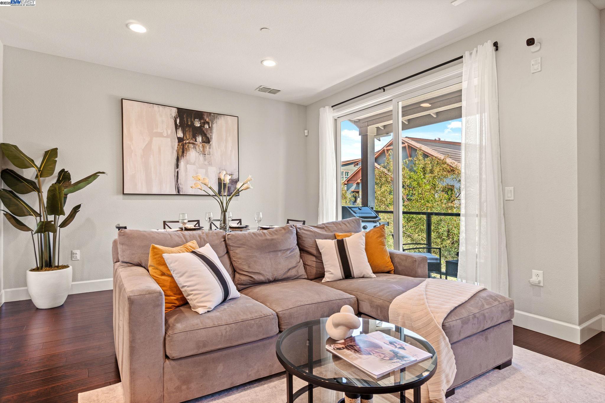 849 Tranquility Circle, Unit 3 Livermore, CA 94551 - Photo 6 of 60 a living room with furniture and a large window