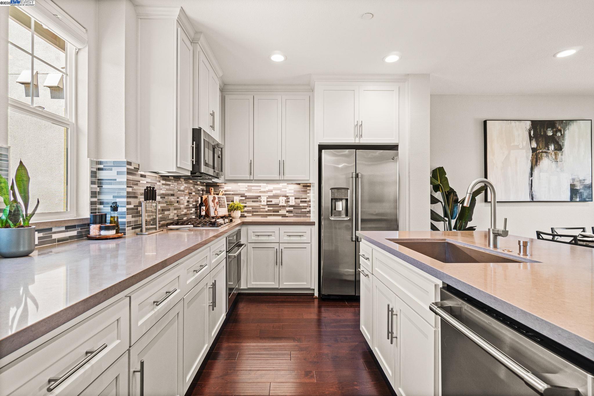 849 Tranquility Circle, Unit 3 Livermore, CA 94551 - Photo 7 of 60 a kitchen with refrigerator and cabinets