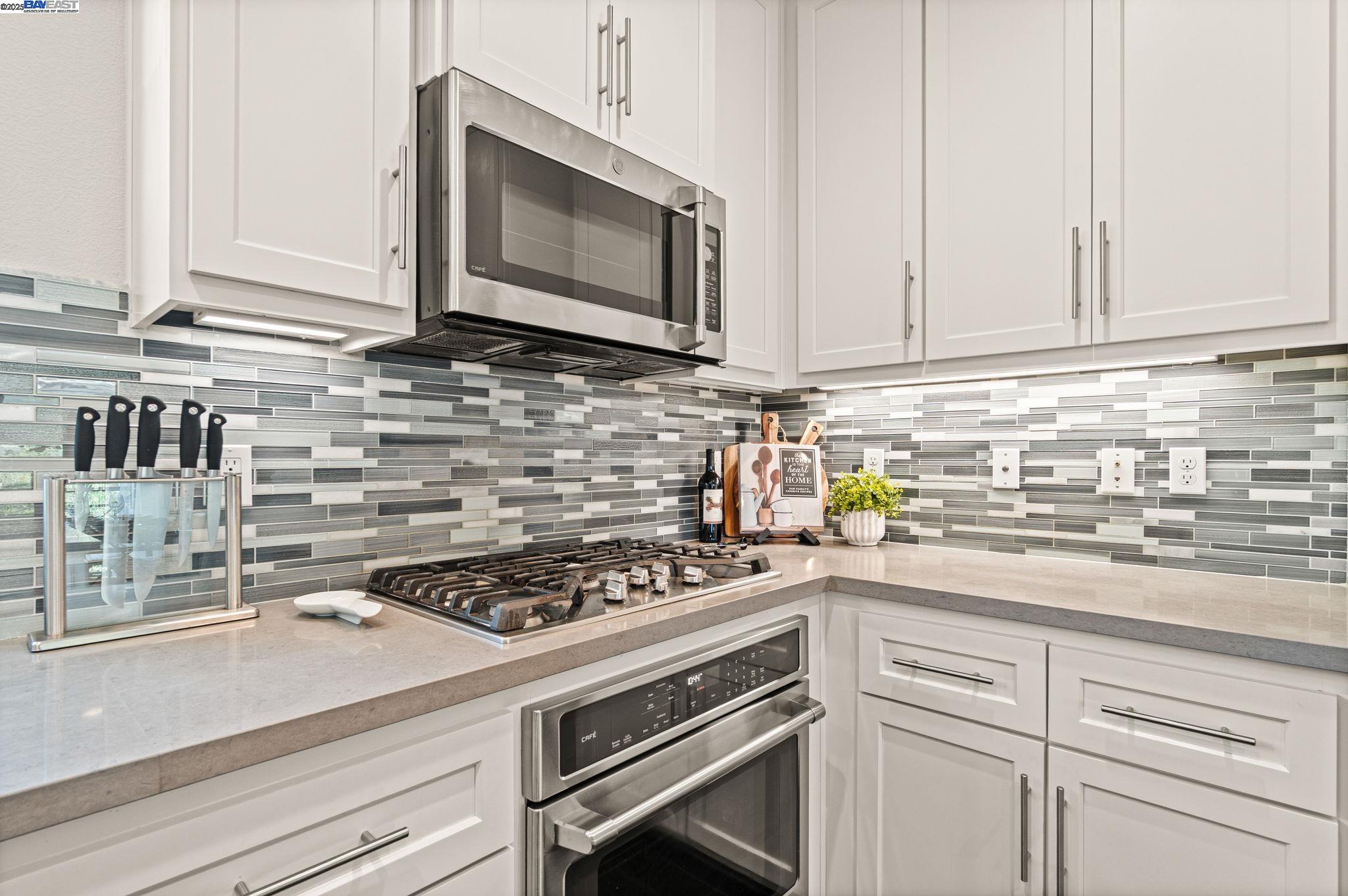 849 Tranquility Circle, Unit 3 Livermore, CA 94551 - Photo 8 of 60 a kitchen with appliances cabinets and a counter top