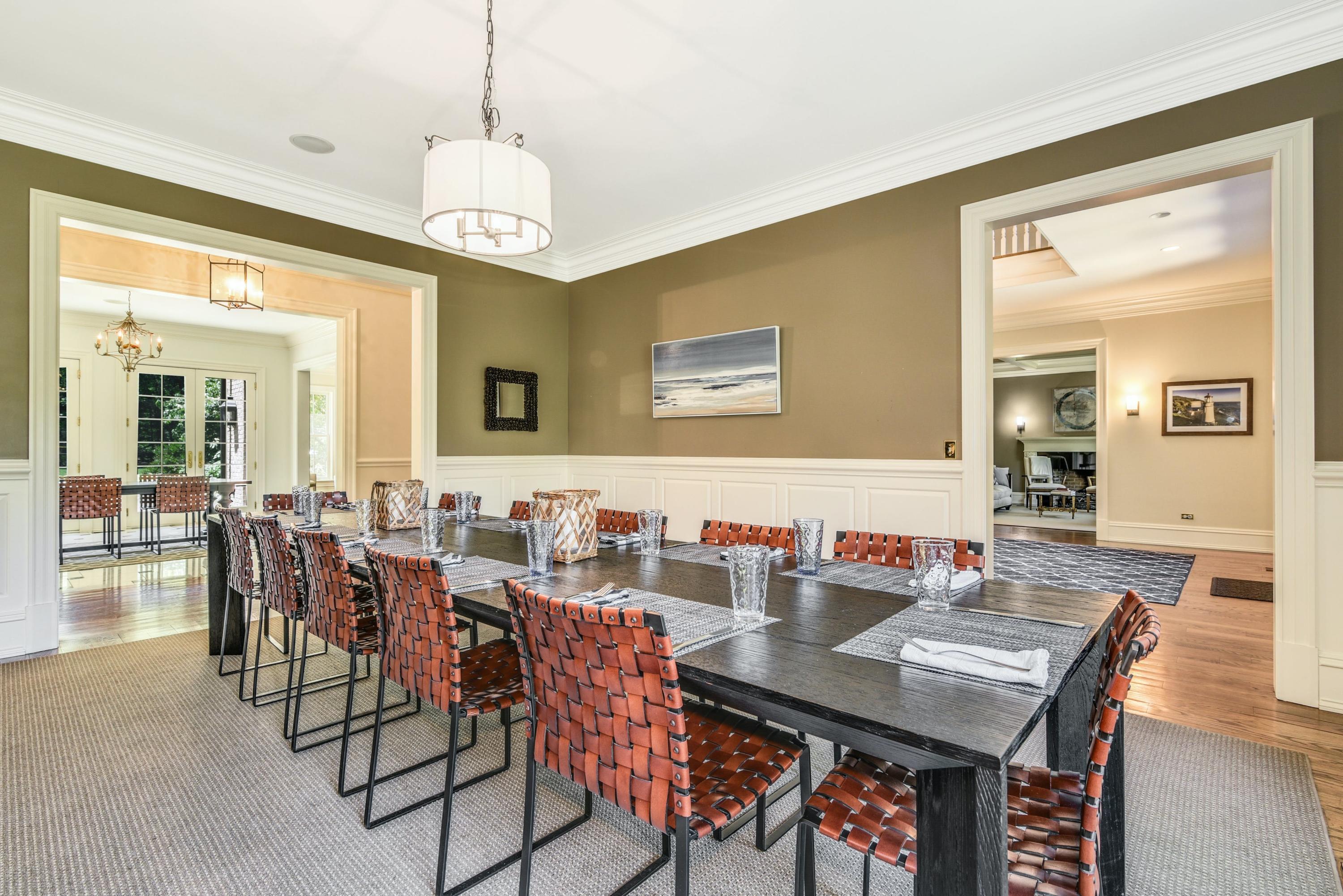 910 Smith Ridge Road New Canaan, CT 06840 - Photo 12 of 40 a view of a dining room with furniture