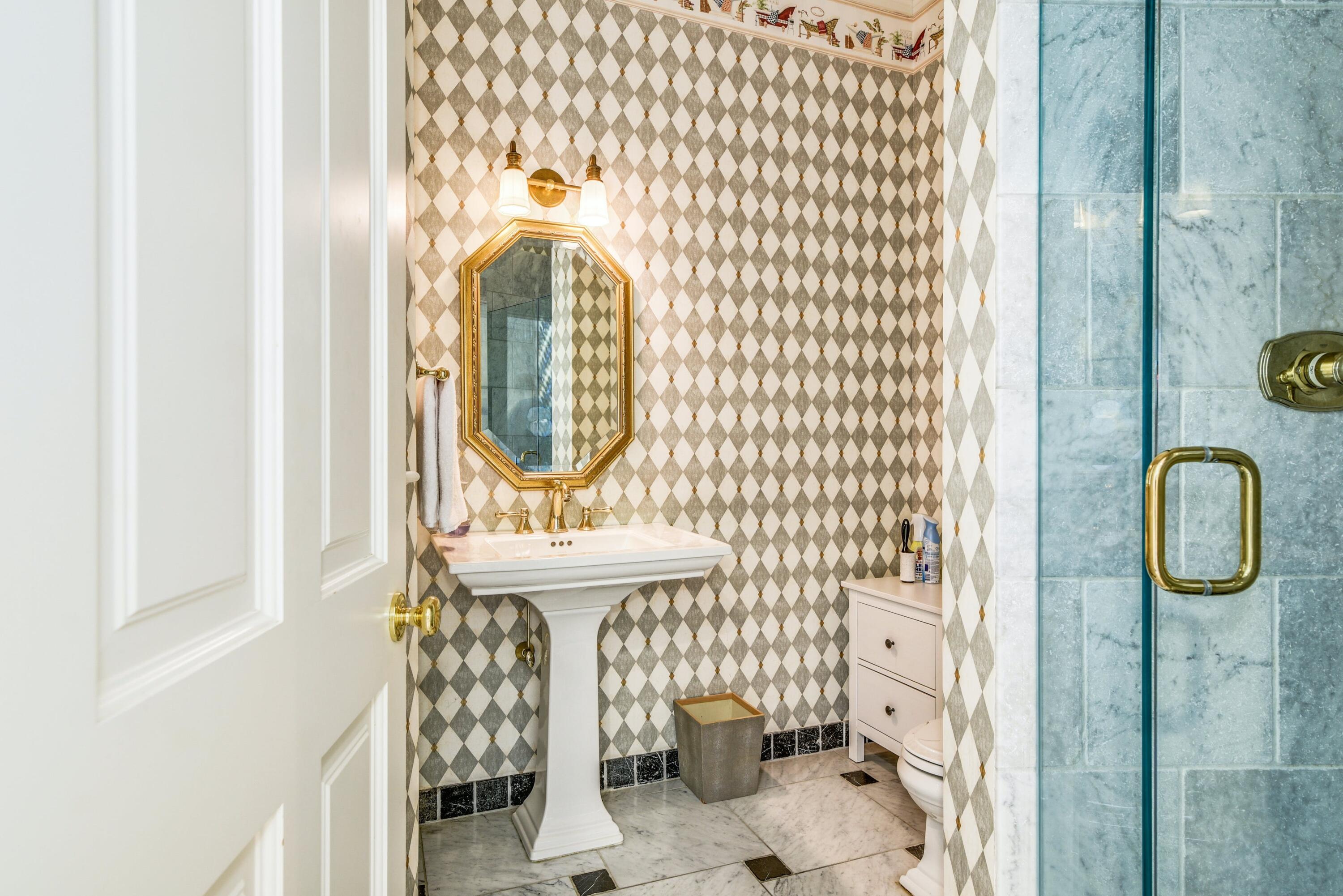 910 Smith Ridge Road New Canaan, CT 06840 - Photo 17 of 40 a bathroom with a sink toilet and shower
