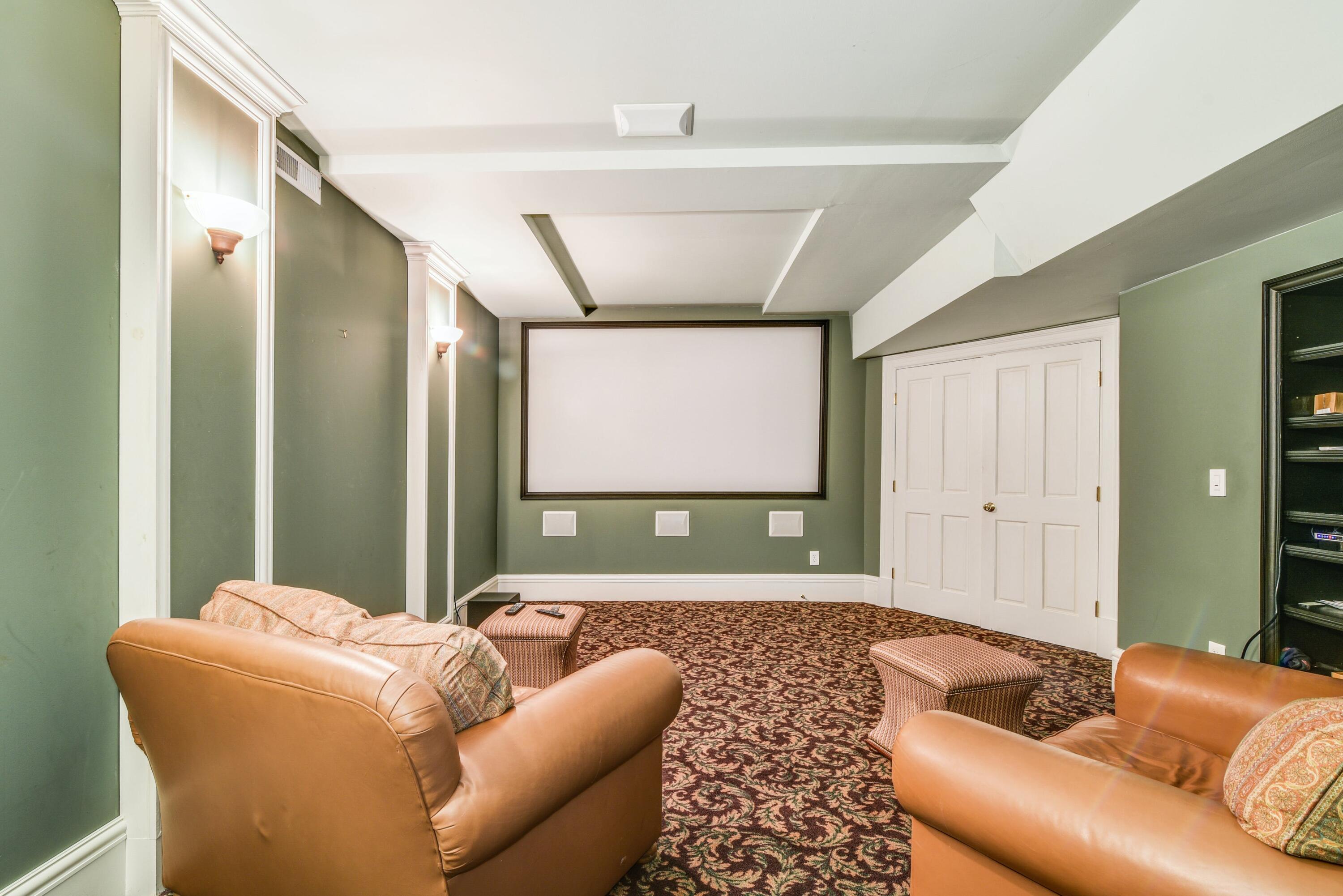 910 Smith Ridge Road New Canaan, CT 06840 - Photo 28 of 40 a living room with furniture and a large window