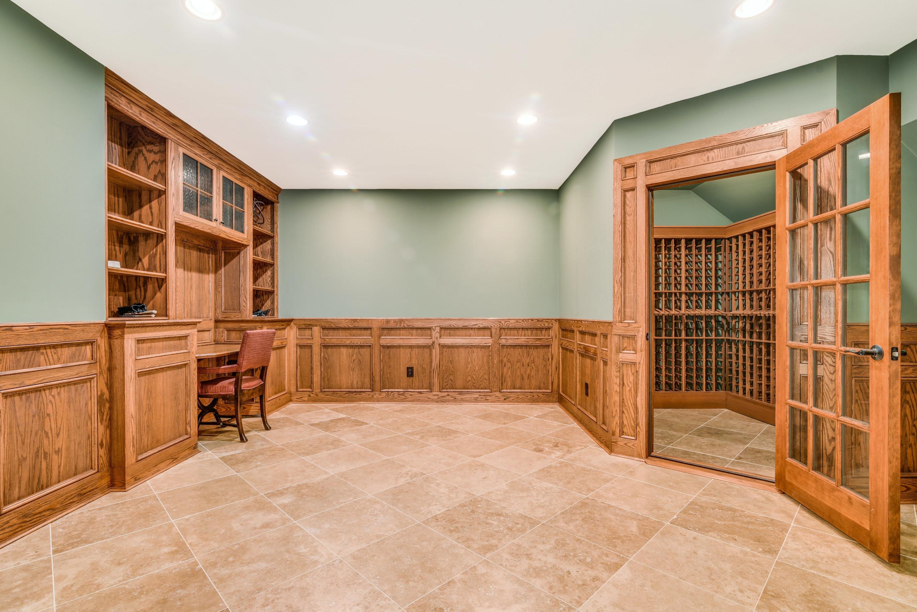 910 Smith Ridge Road New Canaan, CT 06840 - Photo 29 of 40 a view of an empty room with a staircase