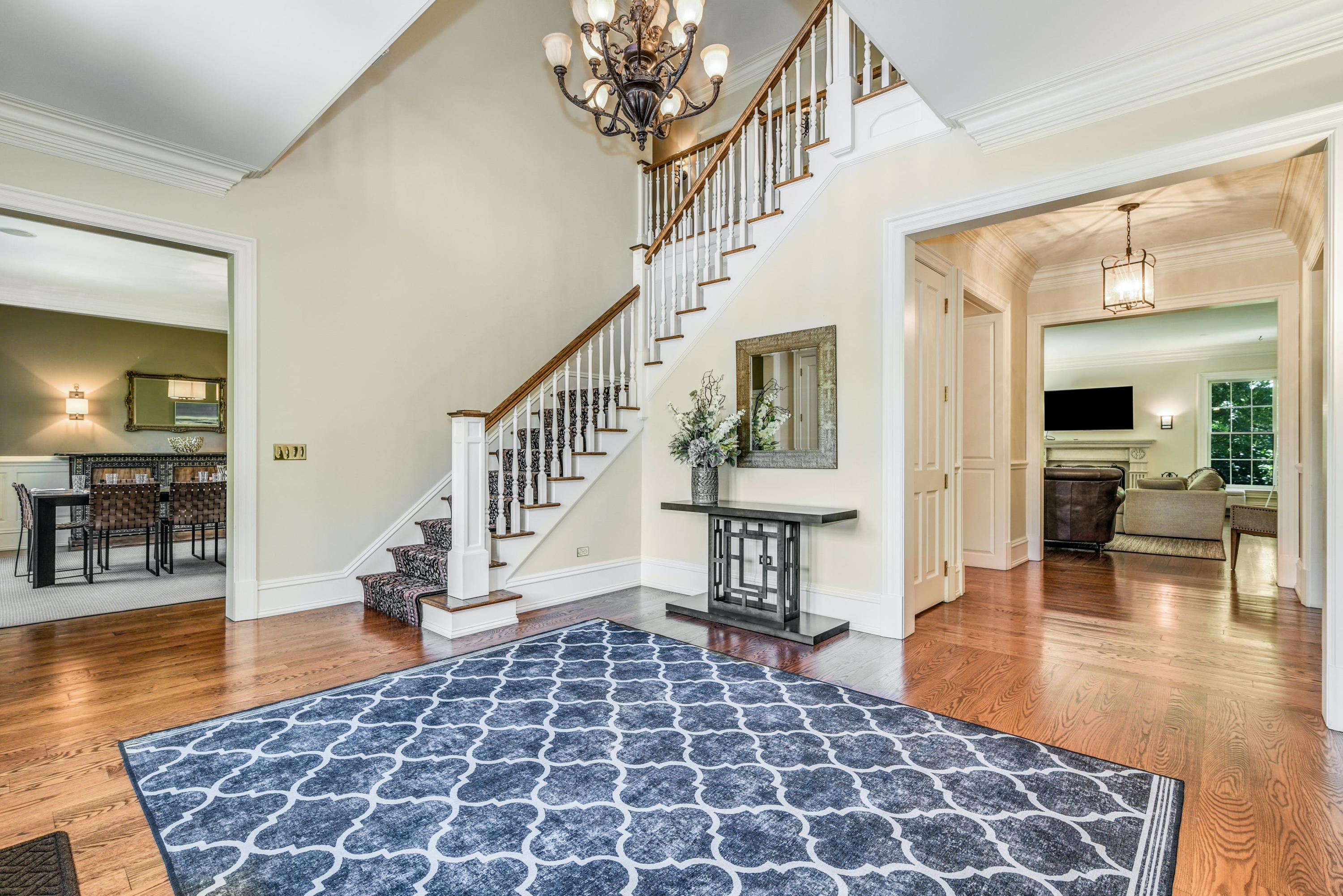 910 Smith Ridge Road New Canaan, CT 06840 - Photo 6 of 40 a view of an entryway with wooden floor