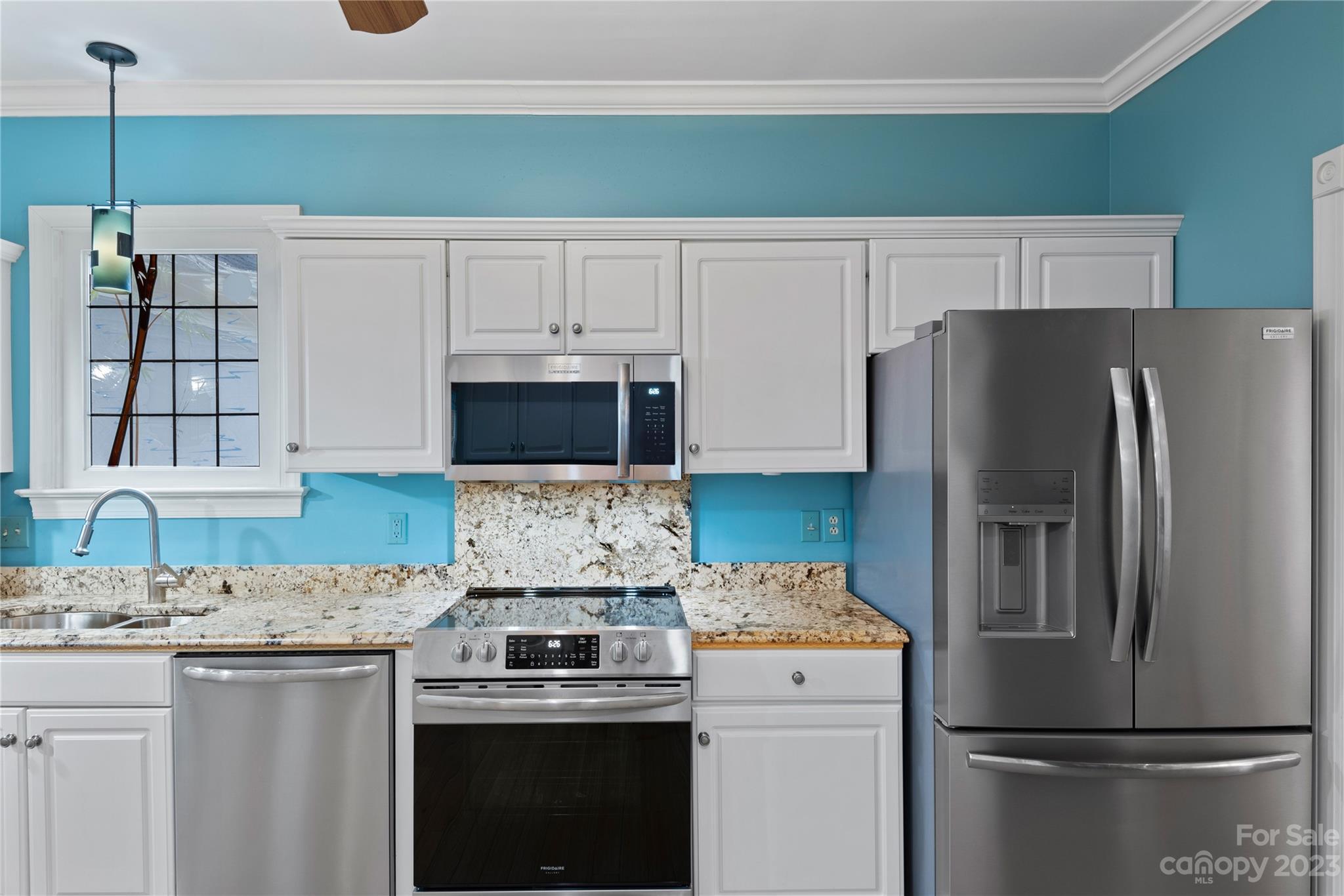 7604 Bosham Lane Charlotte, NC 28270 - Photo 12 of 39 a kitchen with stainless steel appliances a refrigerator and a stove
