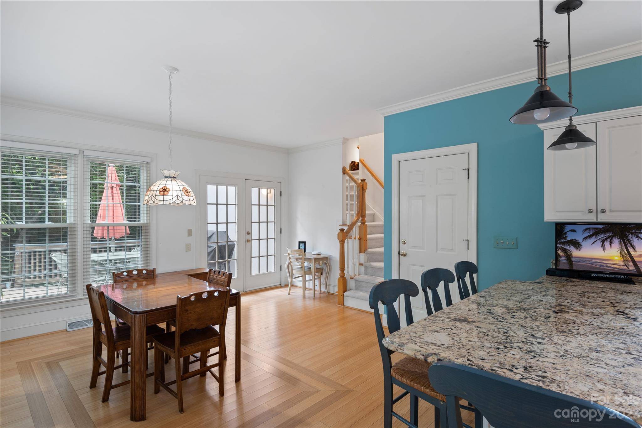 7604 Bosham Lane Charlotte, NC 28270 - Photo 14 of 39 a view of a a dining room with furniture window and wooden floor