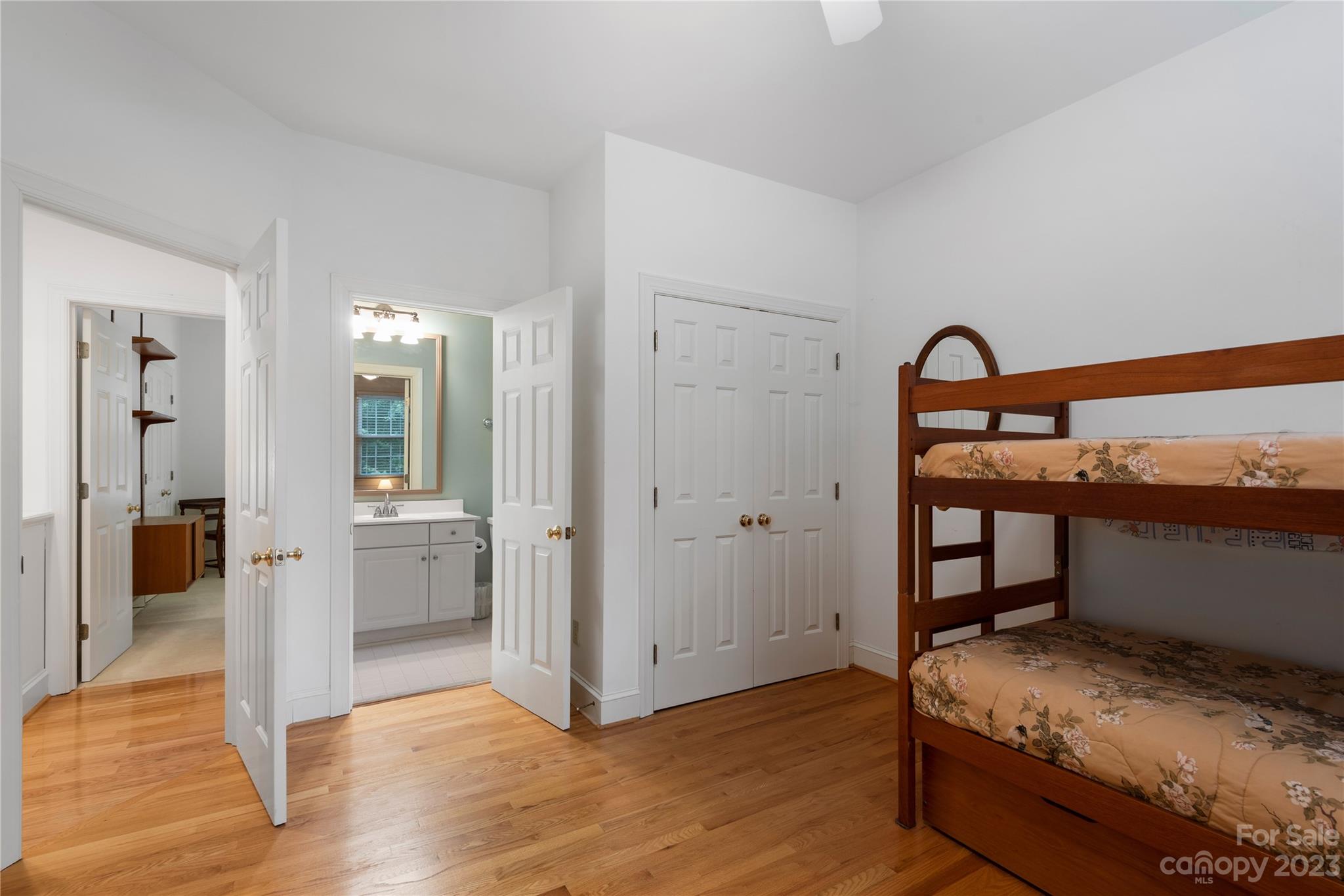 7604 Bosham Lane Charlotte, NC 28270 - Photo 27 of 39 a bedroom with a bed and a dresser
