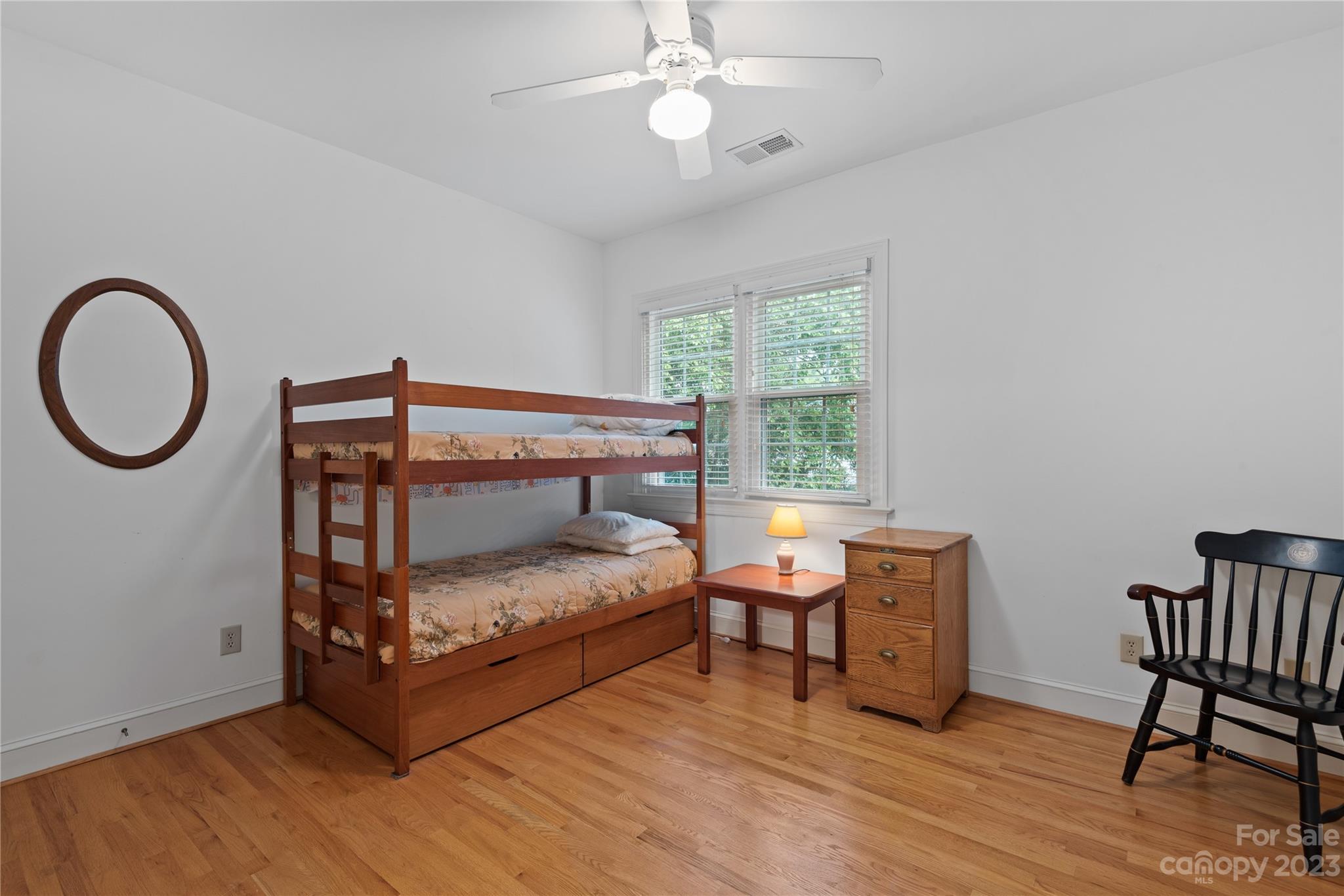 7604 Bosham Lane Charlotte, NC 28270 - Photo 28 of 39 a bedroom with furniture and a window