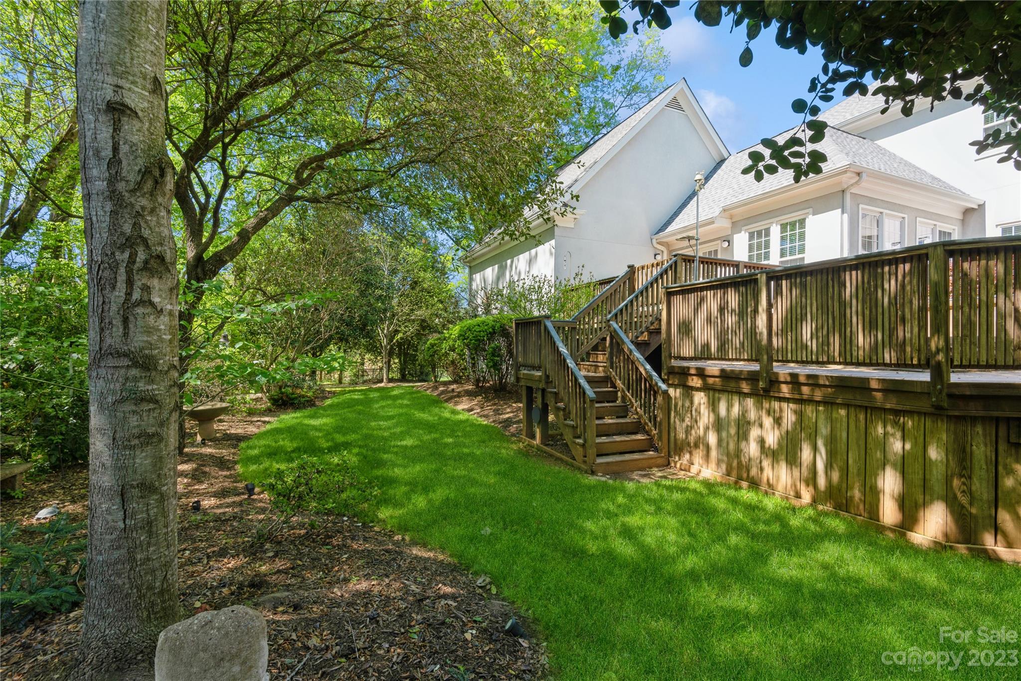 7604 Bosham Lane Charlotte, NC 28270 - Photo 34 of 39 a view of a house with a yard from a lake