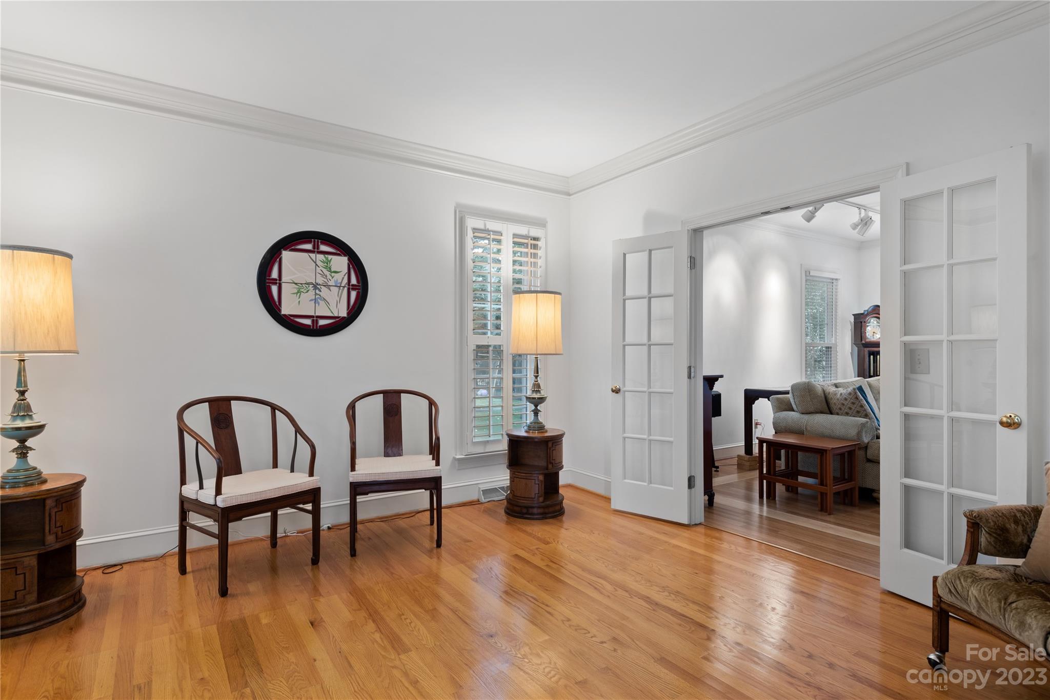7604 Bosham Lane Charlotte, NC 28270 - Photo 6 of 39 a living room with furniture and a wooden floor