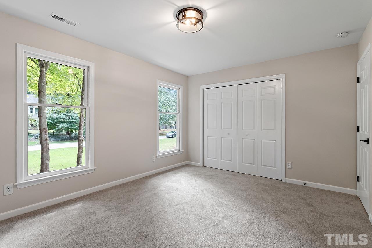 8805 Wellsley Way Raleigh, NC 27613 - Photo 24 of 39 a view of empty room with window