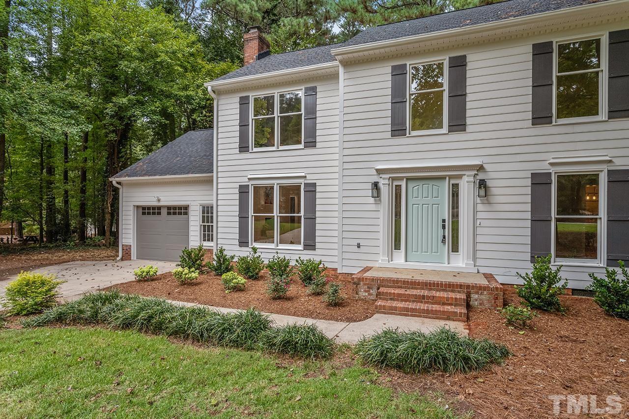 8805 Wellsley Way Raleigh, NC 27613 - Photo 31 of 39 a front view of a house with garden