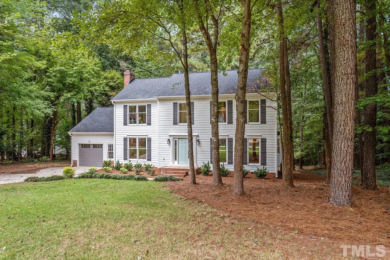 8805 Wellsley Way Raleigh, NC 27613 - Photo 32 of 39 front view of a house with a yard