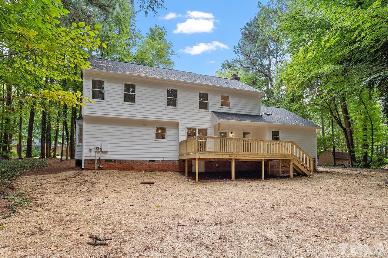 8805 Wellsley Way Raleigh, NC 27613 - Photo 35 of 39 a view of a house with a yard