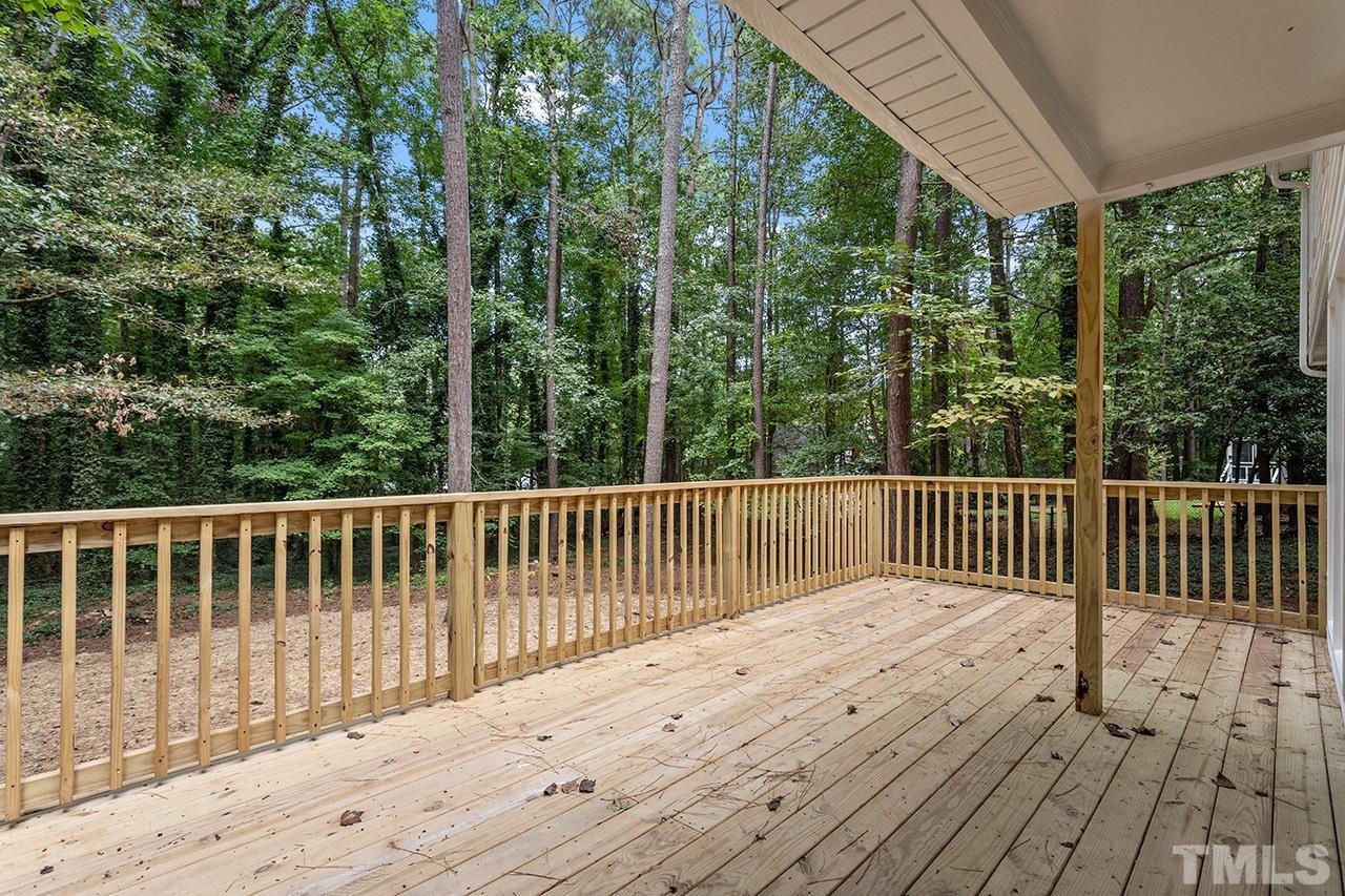8805 Wellsley Way Raleigh, NC 27613 - Photo 37 of 39 a view of balcony with wooden floor