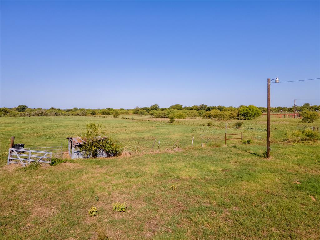 1300 Old Base Road Aurora, TX 76078 - Photo 23 of 27 a view of a lake with a city