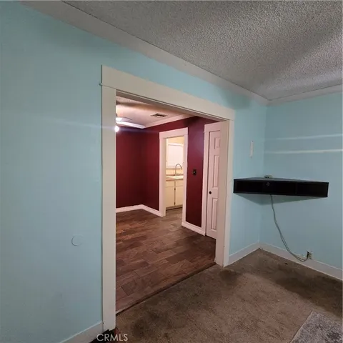 a view of an empty room and window