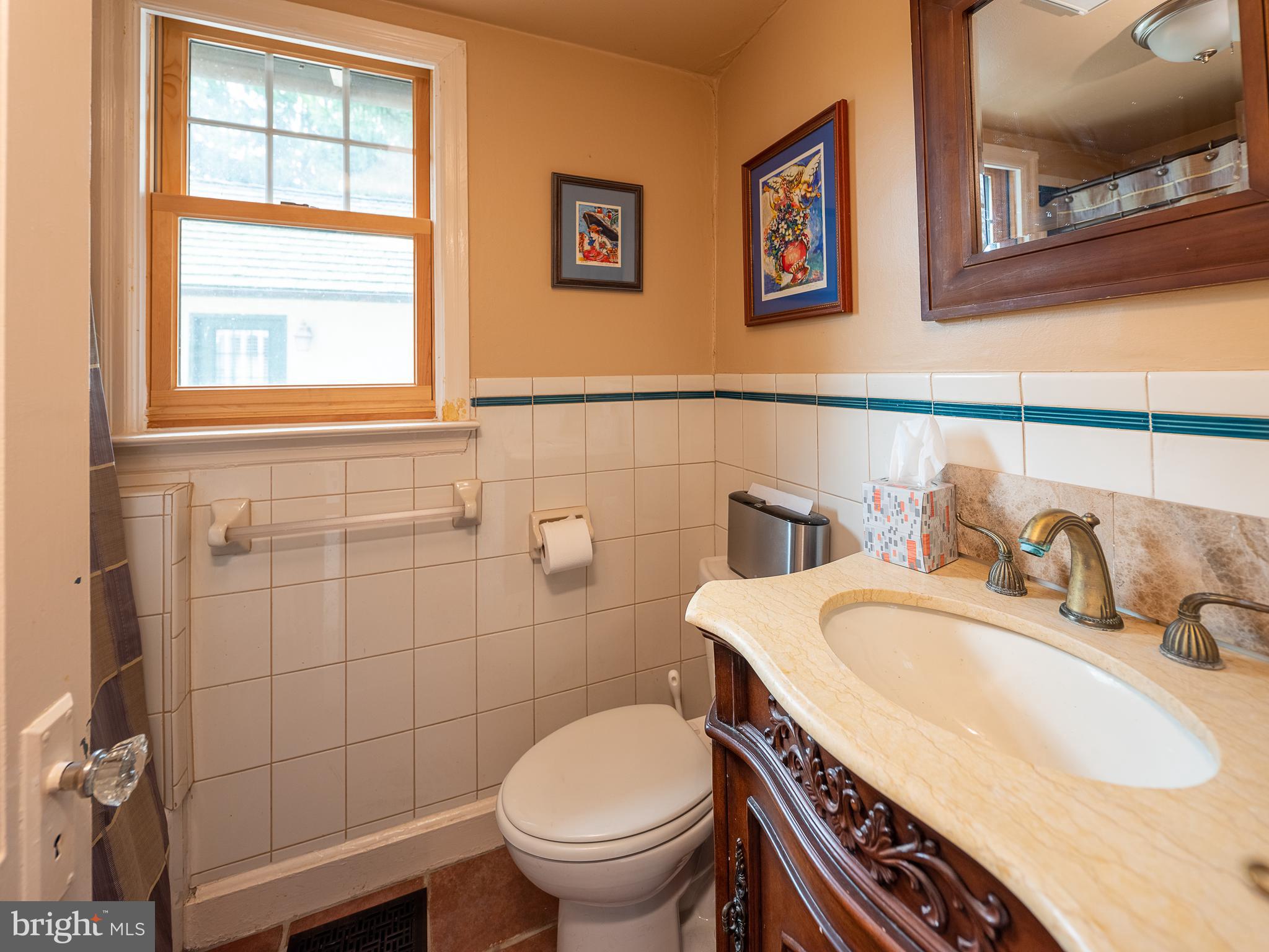 1601 Forest Grove Road Furlong, PA 18925 - Photo 23 of 57 a bathroom with a sink and a toilet