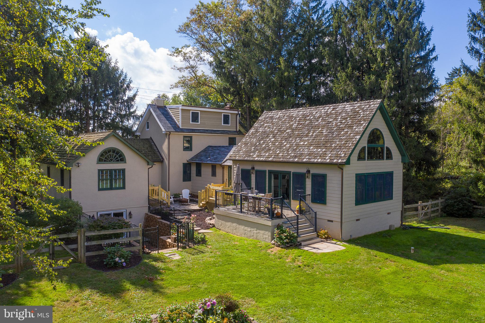 1601 Forest Grove Road Furlong, PA 18925 - Photo 4 of 57 a front view of house with a garden and swimming pool