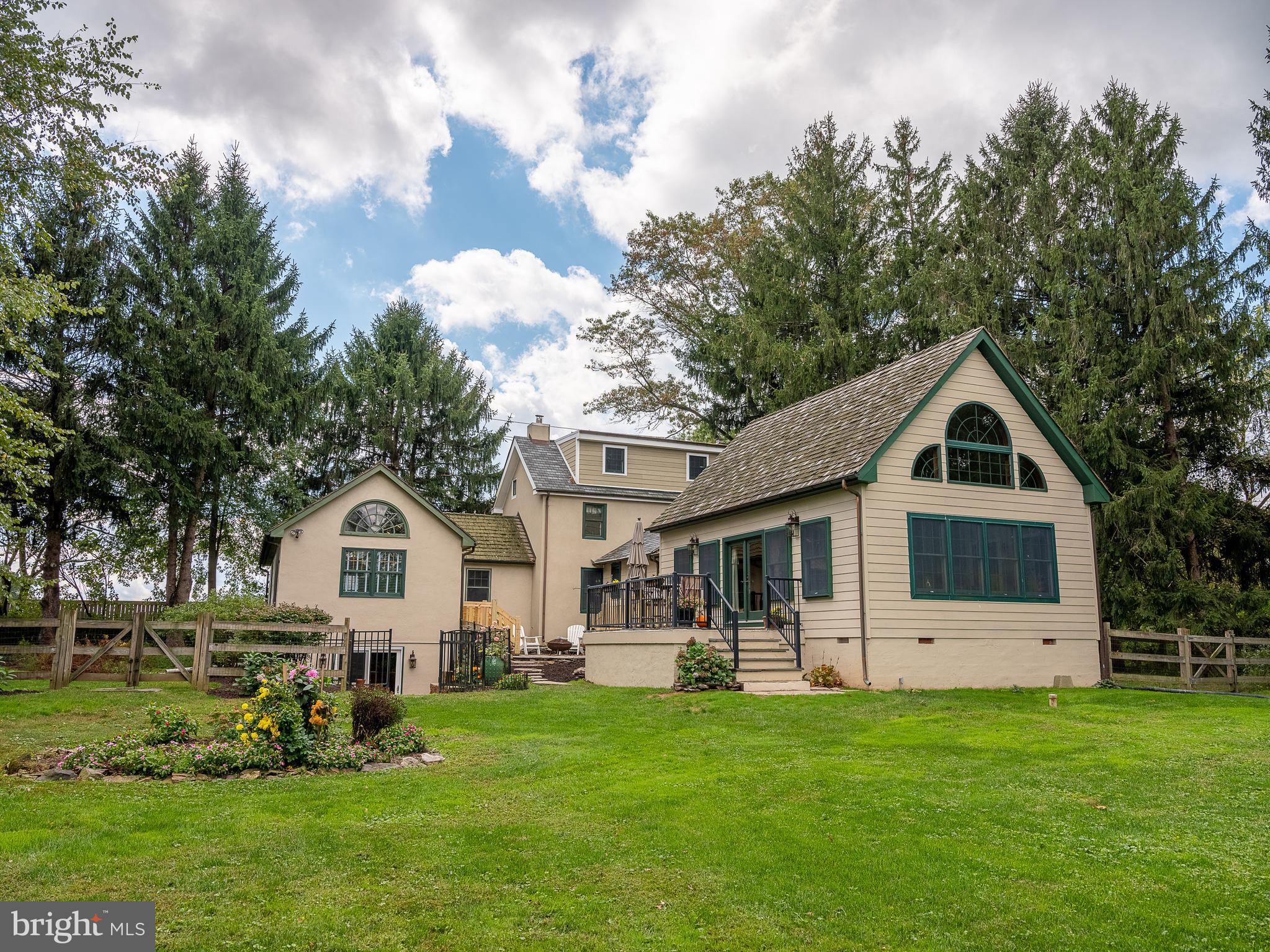 1601 Forest Grove Road Furlong, PA 18925 - Photo 5 of 57 a front view of a house with a yard and trees