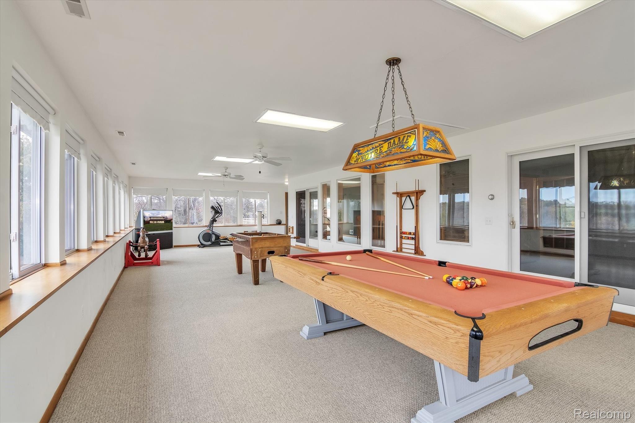 4211 Crandall Road Howell, MI 48855 - Photo 17 of 42 Super Large Rec Room with Expansive Views has it's own HVAC zone