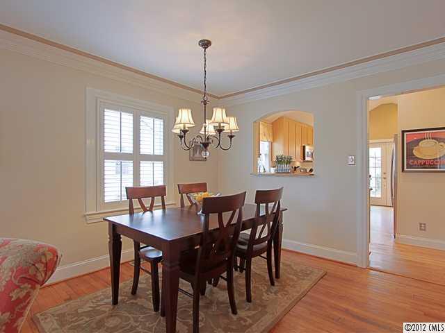 2012 Club Road Charlotte, NC 28205 - Photo 4 of 15 a view of a dining room with furniture window and wooden floor