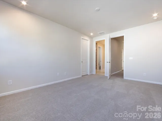 an empty room with an entryway