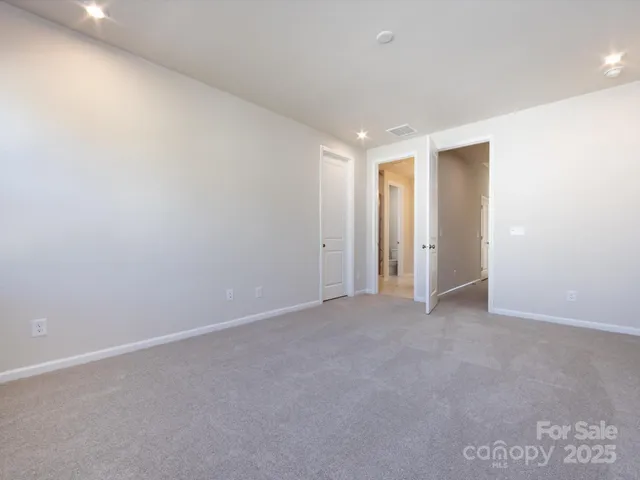 an empty room with an entryway