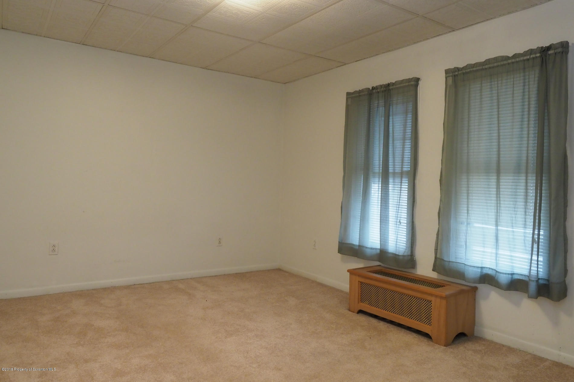824 Green Ridge Street Scranton, PA 18509 - Photo 12 of 17 an empty room with windows