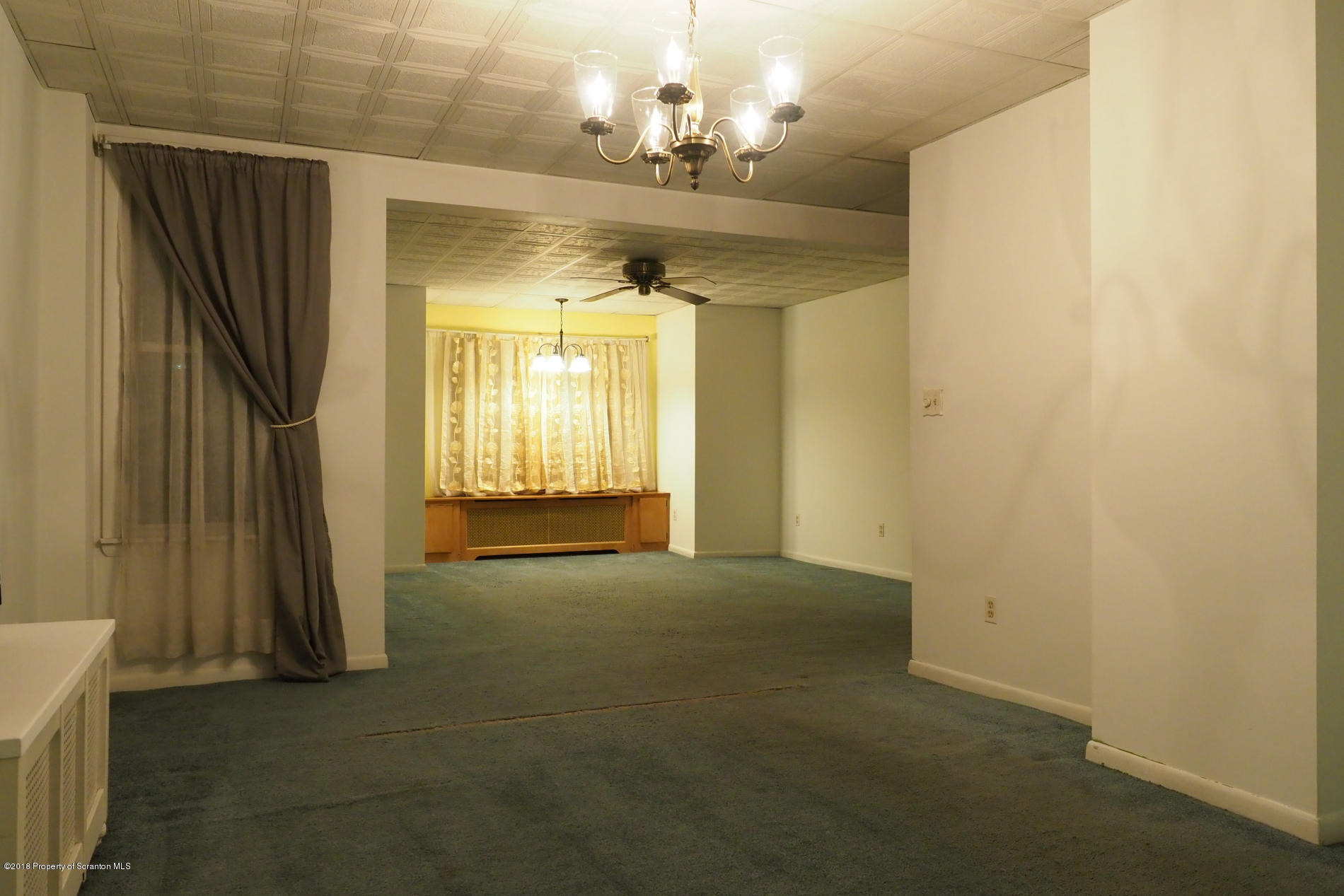 824 Green Ridge Street Scranton, PA 18509 - Photo 2 of 17 a view of a livingroom with a chandelier