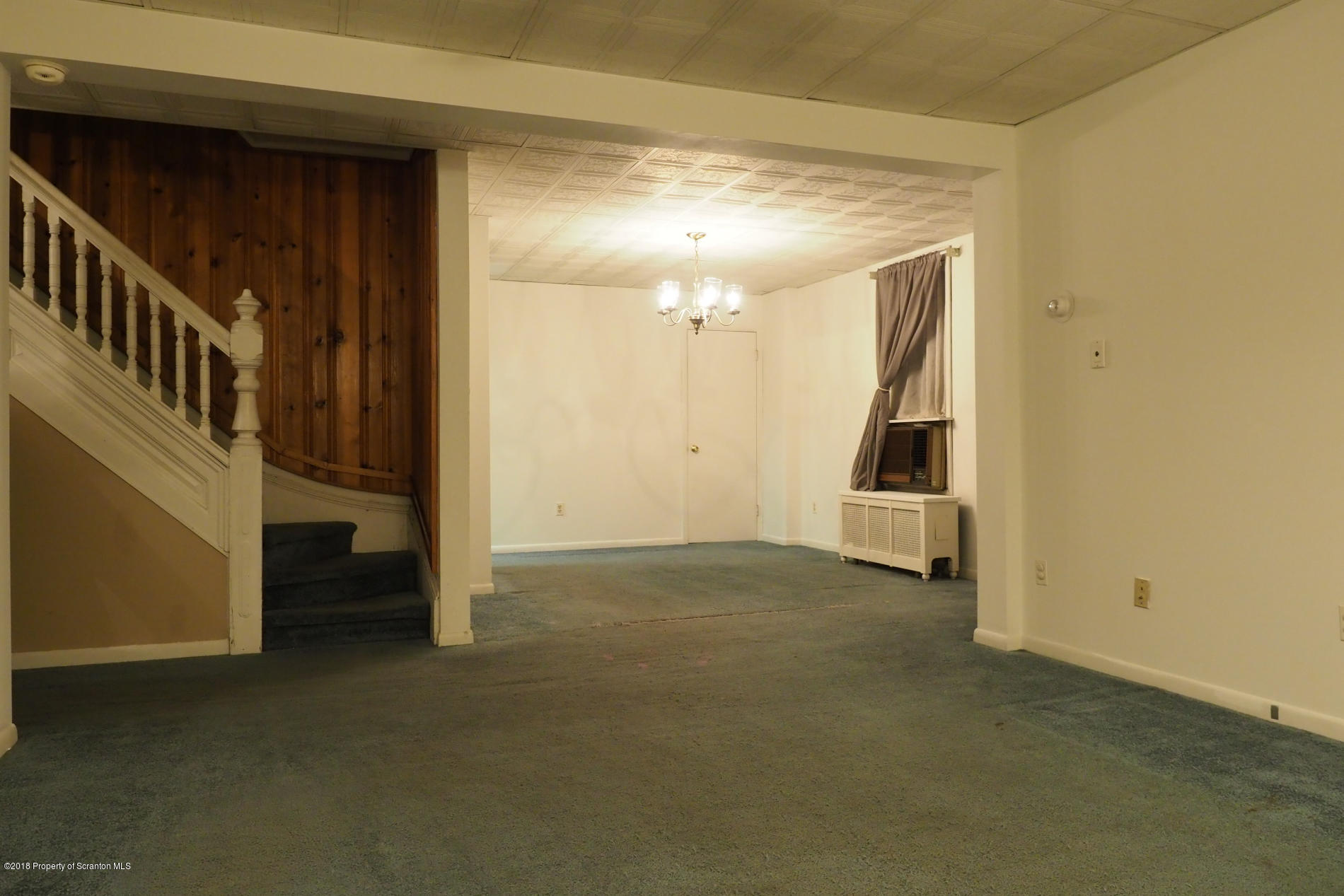824 Green Ridge Street Scranton, PA 18509 - Photo 3 of 17 a view of a room with stairs